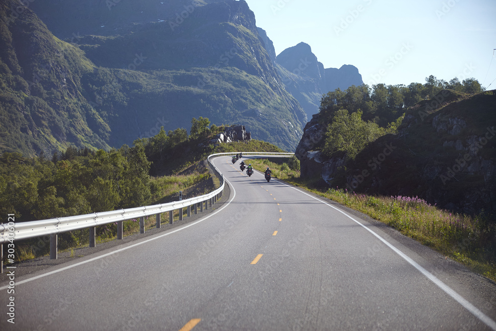 Mountain road in Norway, motorcyclists