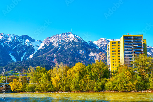 a multi-storey house in the mountains in spring 