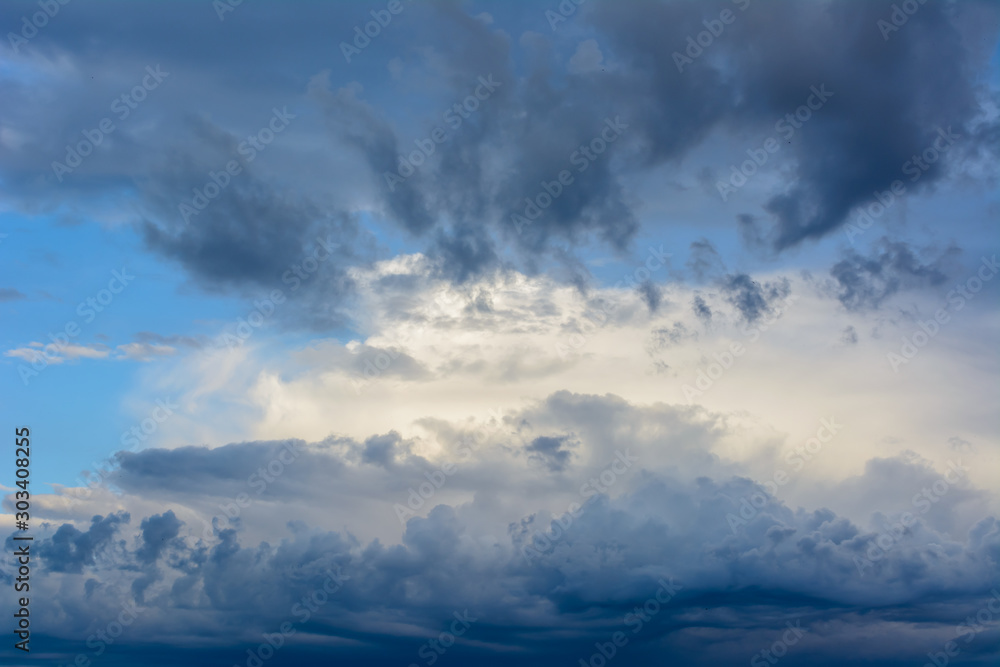 Beautiful sky with heavy, rainy clouds. Bright clouds.