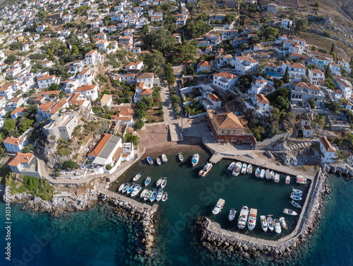 Aerial view of Kamini village, pier and beach in Hydra Island