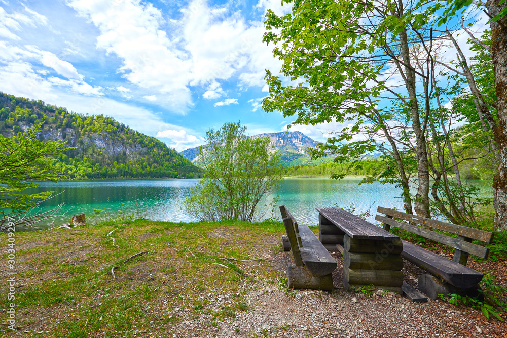 Beautiful Offensee lake landscape with mountains, forest, clouds and resting-place in Austrian Alps. Salzkammergut region. Beautiful Offensee lake landscape with mountains, forest, clouds and resting-place in Austrian Alps. Salzkammergut region.