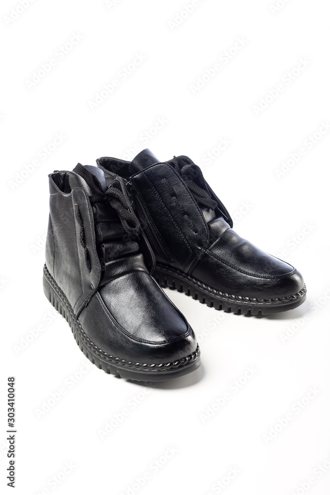 black new leather shoes on white background