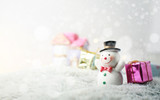Happy smiling snow man on sunny winter day.Merry Christmas concept background.