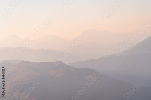 Sunset in the mountains. Mountain view in the fog © mazurevanasta