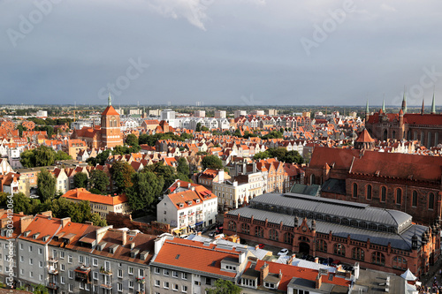 Gdansk, Poland - 08.16.2019: View of the rooftops of the old city from the bell tower of the Cathedral of St. Katarzyna.