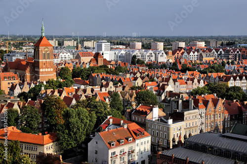 Gdansk, Poland - 08.16.2019: View of the rooftops of the old city from the bell tower of the Cathedral of St. Katarzyna.