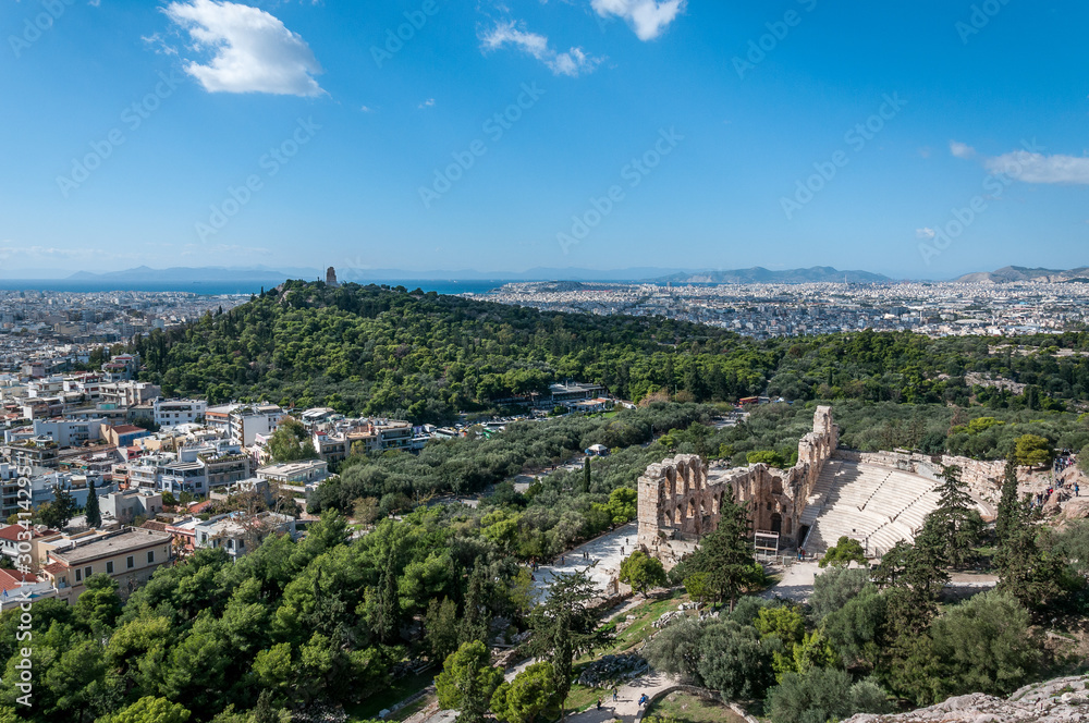 Panorama of the city of Athens, with Odeo of Herod Atticus, Acropolis, Greece. Concept: classical culture, famous monuments, ancient history, cultural travel, visiting unesco world heritage