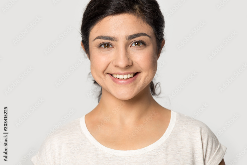 Head shot portrait beautiful Indian girl with healthy smile Head shot portrait beautiful Indian girl with healthy smile