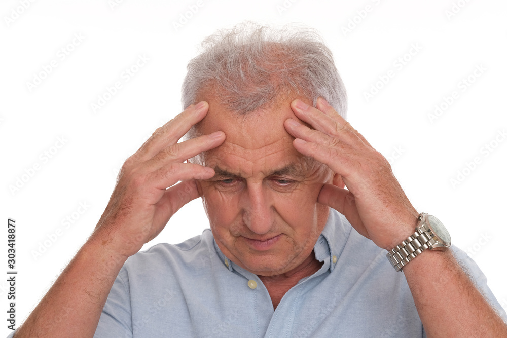 Older man is having a headache. Patient isolated on white background. Older man is having a headache. Patient isolated on white background.