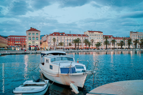 Travel by Croatia. Beautiful landscape with Split Old Town on sea shore. Boats at the harbour.