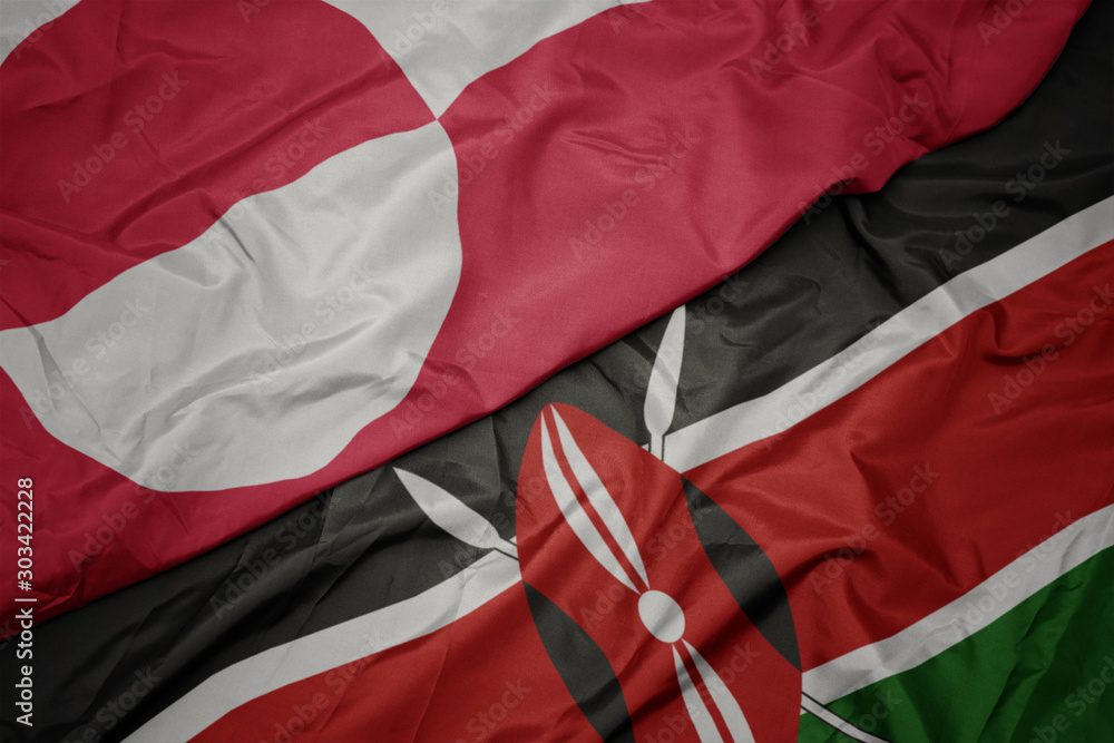 waving colorful flag of kenya and national flag of greenland. waving colorful flag of kenya and national flag of greenland.