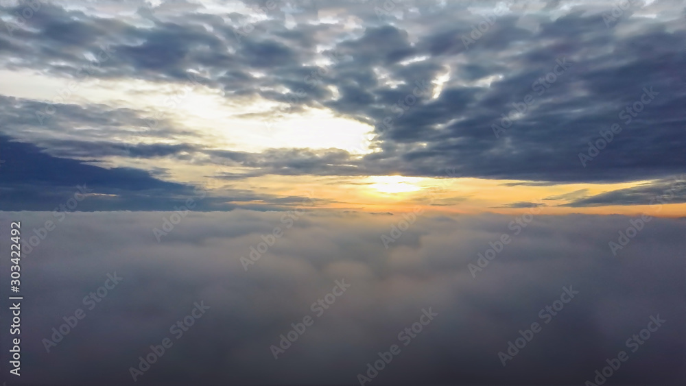 Fly Above the Clouds During Sunrise. Flying Drone Into the Misty Clouds at Evening. Aerial Dron Shoot. Fly Above the Clouds During Sunrise. Flying Drone Into the Misty Clouds at Evening. Aerial Dron Shoot.