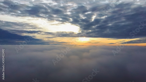 Fly Above the Clouds During Sunrise. Flying Drone Into the Misty Clouds at Evening. Aerial Dron Shoot.