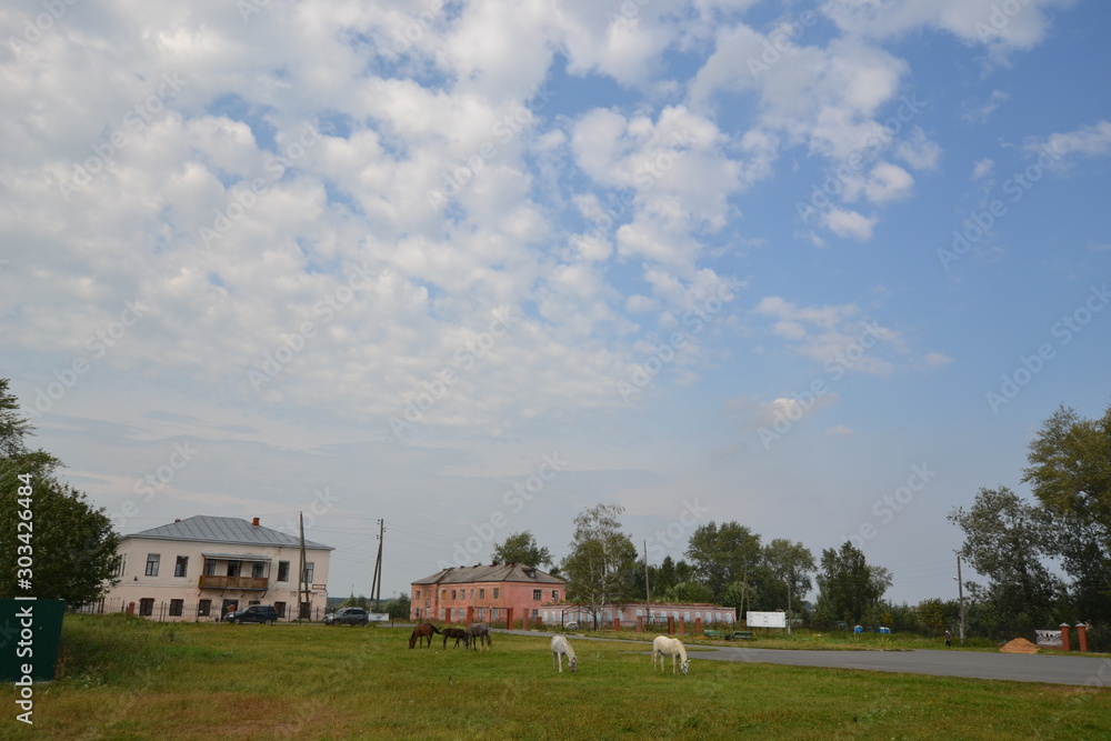 The sky above Usolye: the former main Stroganov patrimony on Kama and the Urals on a cloudy summer day The sky above Usolye: the former main Stroganov patrimony on Kama and the Urals on a cloudy summer day