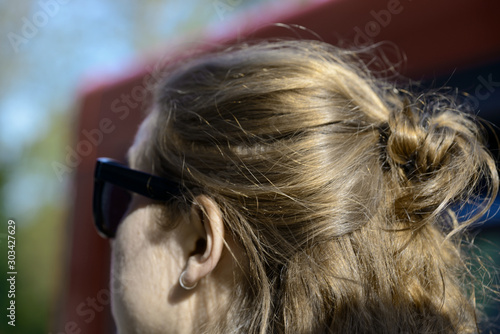 hair and comb and glasses on woman, stockholm, sweden