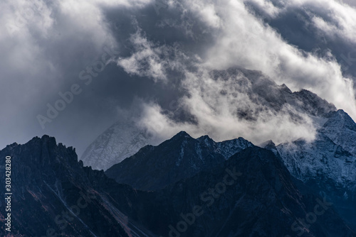 thunderstorm clouds over mountains in the stubai valley, tyrol