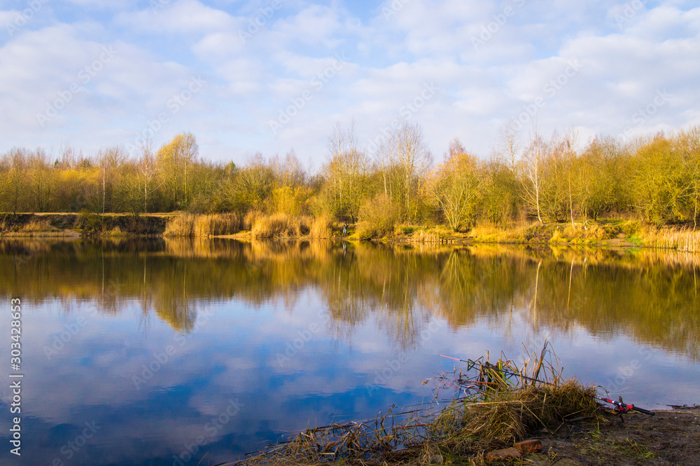 Autumn forest beautiful lake with blue sky. Autumn forest beautiful lake with blue sky.
