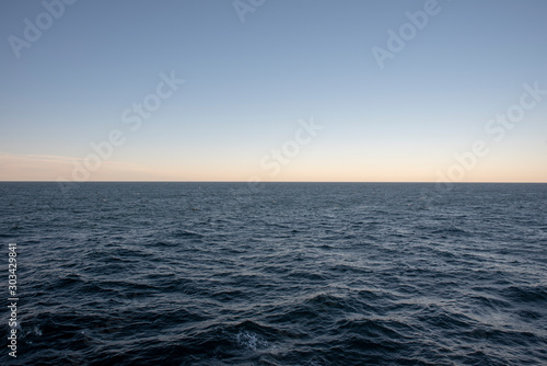 ocean horizon with blue sky water
