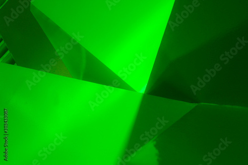 Green abstract diagonals background in painted metal 