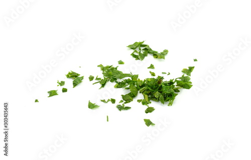Fresh green chopped parsley leaves isolated on white background and texture  top view. Chopped parsley on a white background isolated. Chopped Parsley Leaves. Fresh Herbs 