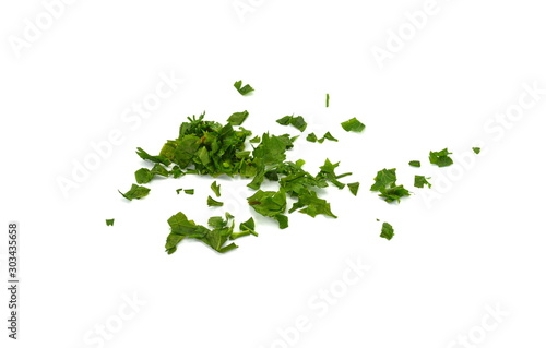 Fresh green chopped parsley leaves isolated on white background and texture, top view. Chopped parsley on a white background isolated. Chopped Parsley Leaves. Fresh Herbs 