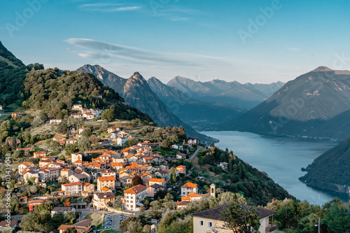 View of Swiss village bre sopra and Lugano Lake before sunset from Monte Bre in Lugano