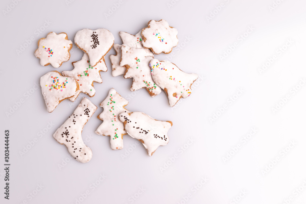 Christmas Ginger and Honey cookie. Gingerbread cookie in tree shape isolated on white background. Christmas Ginger and Honey cookie. Gingerbread cookie in tree shape isolated on white background.