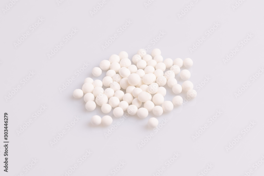 Tapioca pearls or sagu seeds, isolated on white background, soft light, studio photo Tapioca pearls or sagu seeds, isolated on white background, soft light, studio photo