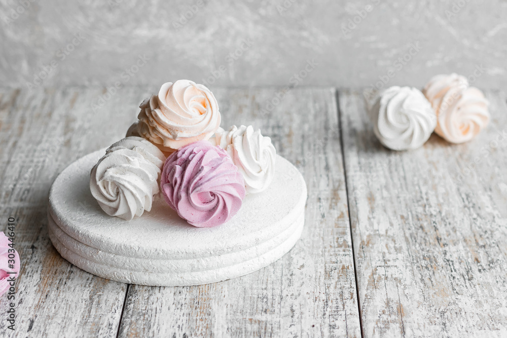 Assorted different flavors of homemade marshmallows. Peach, pink and white marshmallows. Assorted different flavors of homemade marshmallows. Peach, pink and white marshmallows.