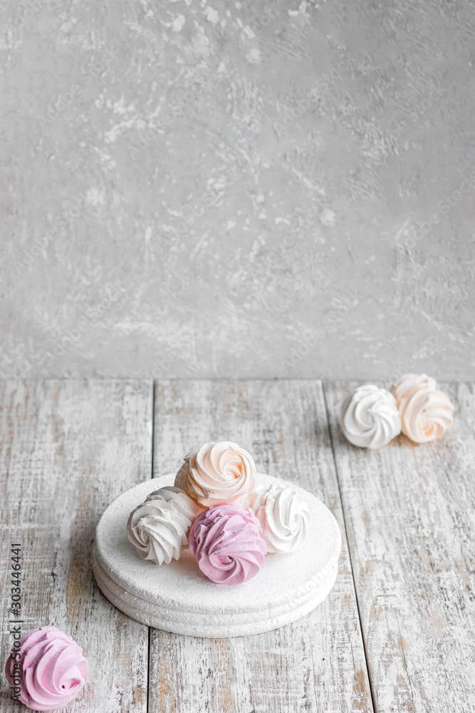 Assorted different flavors of homemade marshmallows. Peach, pink and white marshmallows. Assorted different flavors of homemade marshmallows. Peach, pink and white marshmallows.
