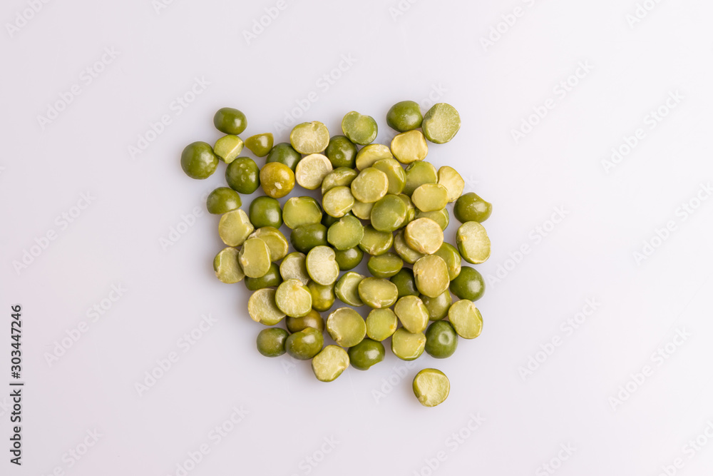 Split dried uncooked peas isolated on white background, close-up, studio shot, soft light, copy space. Christmas dish Split dried uncooked peas isolated on white background, close-up, studio shot, soft light, copy space. Christmas dish