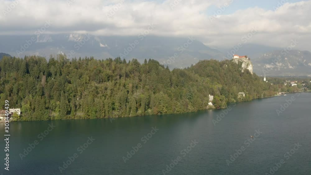 AERIAL VIEW: flight over Lake Bled in Slovenia .Top View of the Church of the Assumption of the Virgin Mary AERIAL VIEW: flight over Lake Bled in Slovenia .Top View of the Church of the Assumption of the Virgin Mary
