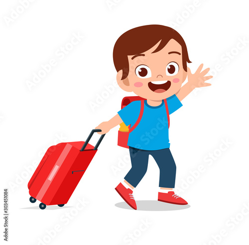 happy cute kid boy pull bag go travel