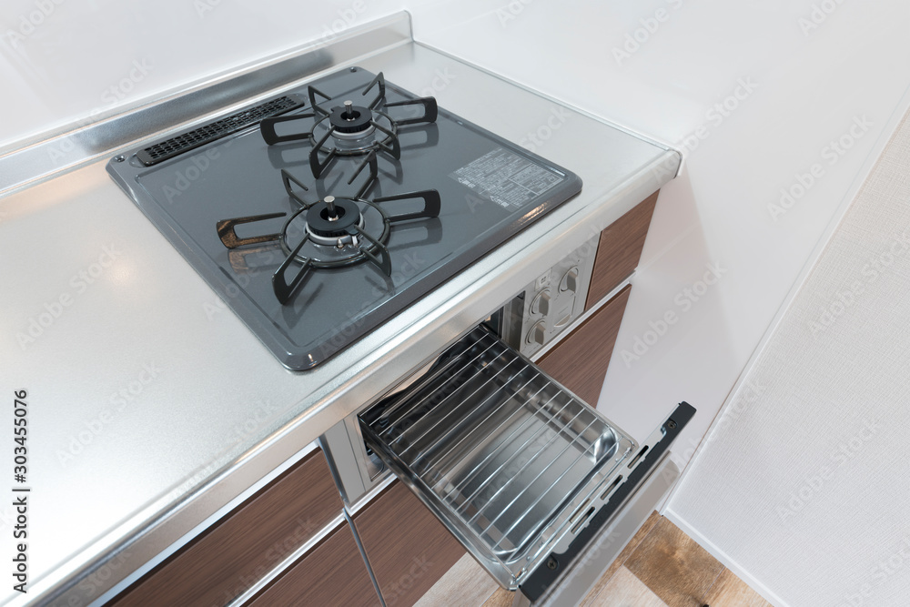 住宅設備 2つ口コンロ 魚焼きグリル付き ガスコンロ Stock 写真 Adobe Stock