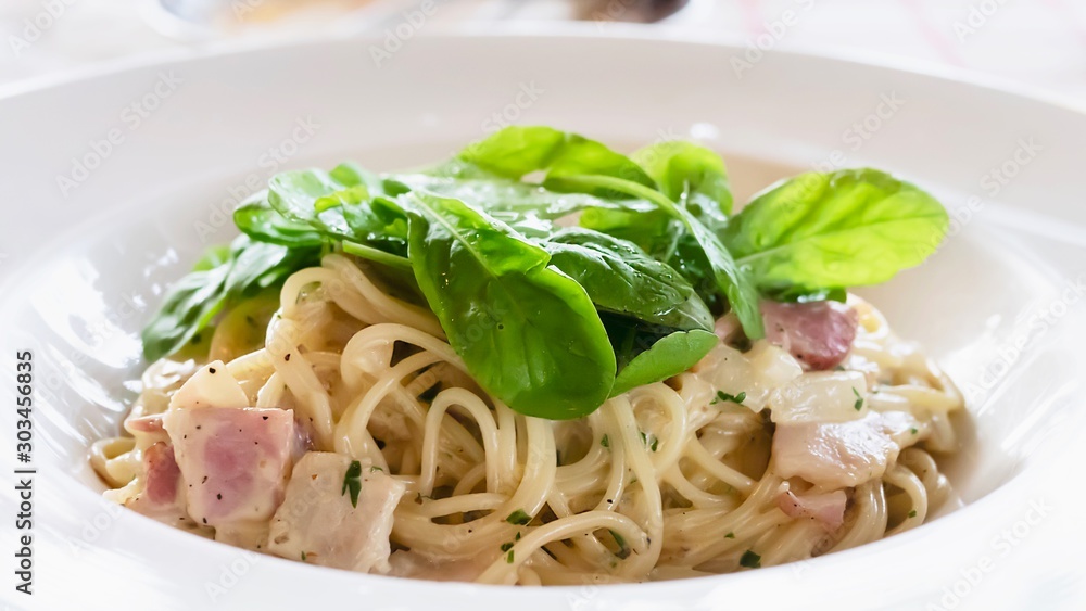 Spaghetti carbonara recipe - famous Italian dish food for background use Spaghetti carbonara recipe - famous Italian dish food for background use