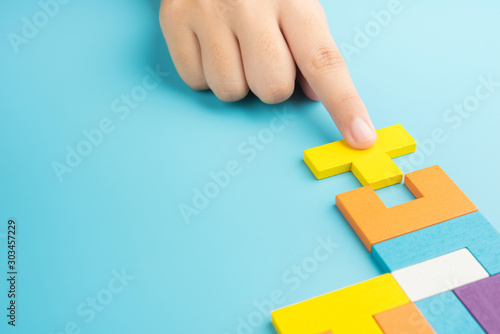 Canvas Print Hand push last piece jigsawto finish success planning concept solve puzzle isola