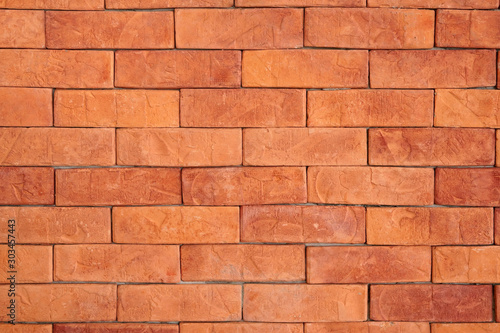 empty orange with brown brick wall or floor with table loft and retro style on top view for texture background and wallpaper or interior and exterior construction