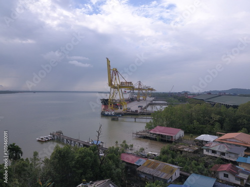 Kuching, Sarawak / Malaysia - November 18 2019: The Senari Port of Sejingkat area where all the cargo ships and containers unload in the Kuching city. photo