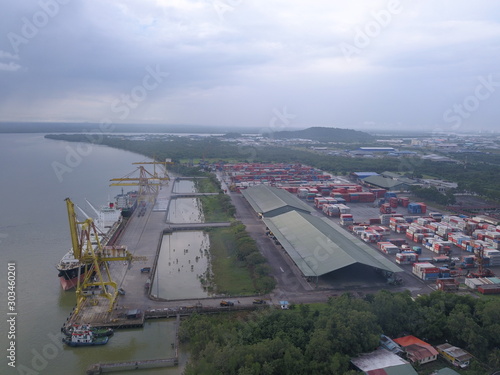 Kuching, Sarawak / Malaysia - November 18 2019: The Senari Port of Sejingkat area where all the cargo ships and containers unload in the Kuching city. photo