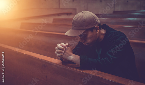 Close up prayer's hand pray in church, Pastor pray to God, with blank copy space