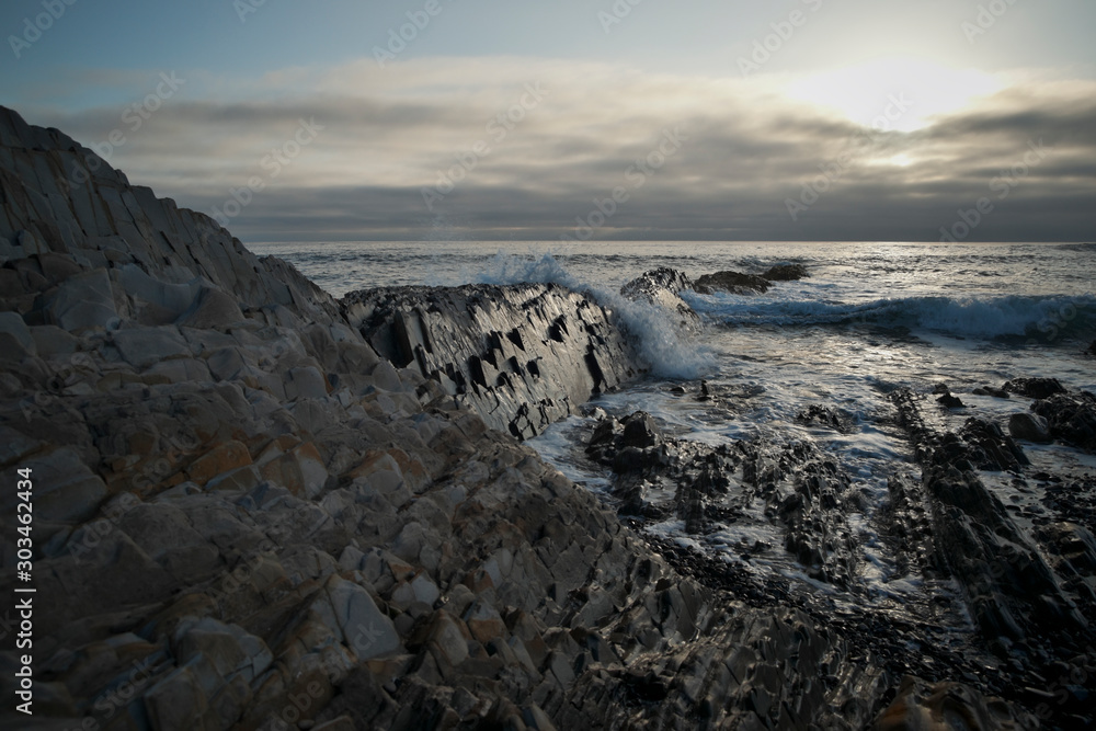 Ocean Waves Crashing on Jagged Rocks in Southern California Ocean Waves Crashing on Jagged Rocks in Southern California