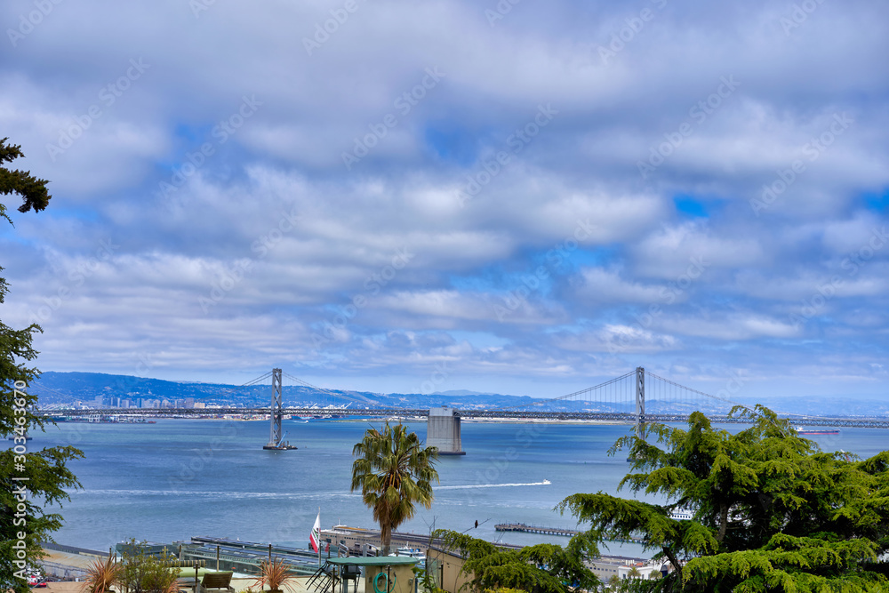 San Francisco, CA, USA - May 15, 2018: View of the suspension bridge over the San Francisco Bay in California between San Francisco and Auckland.