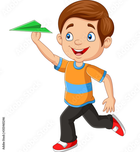 Happy boy playing paper airplane