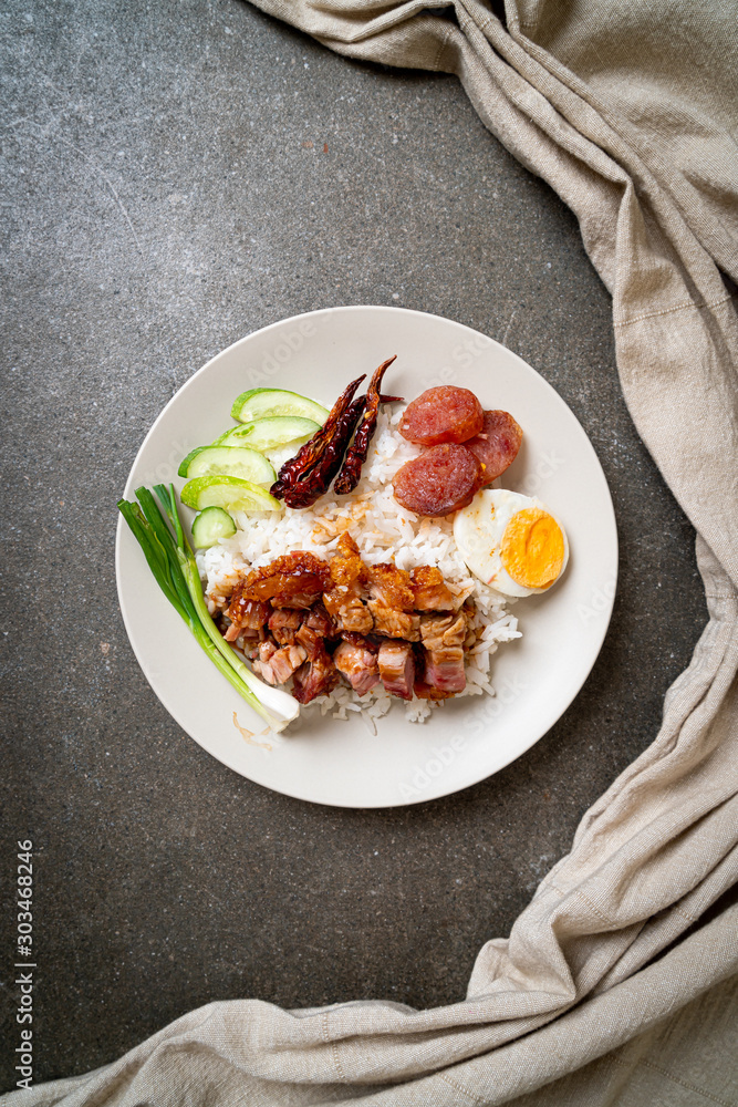 crispy pork belly on topped rice crispy pork belly on topped rice