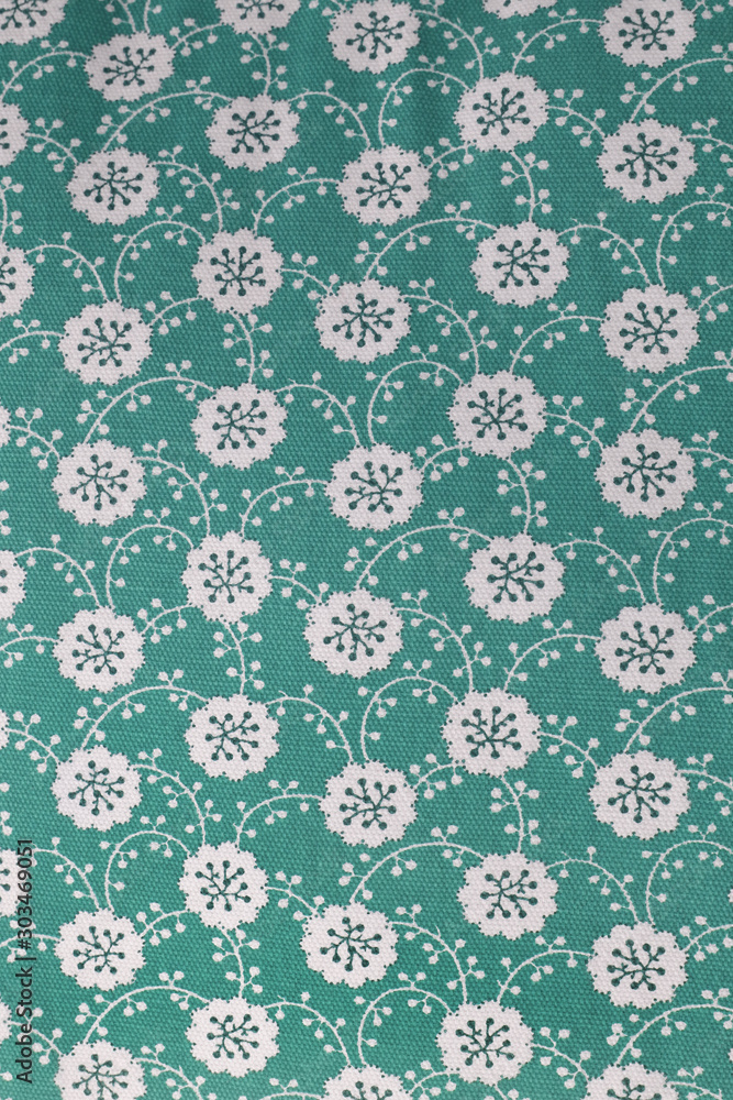 blue beautiful Asian style background with small white flowers, textile texture background decorated with white print pattern in green color, seamless flower pattern design on blue background blue beautiful Asian style background with small white flowers, textile texture background decorated with white print pattern in green color, seamless flower pattern design on blue background