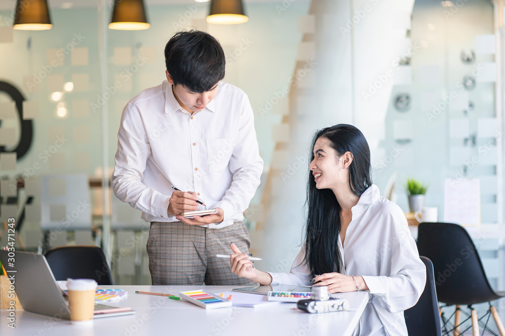 businessman and businesswoman discussing project at meeting. Business analysis and consaulting concept. businessman and businesswoman discussing project at meeting. Business analysis and consaulting concept.