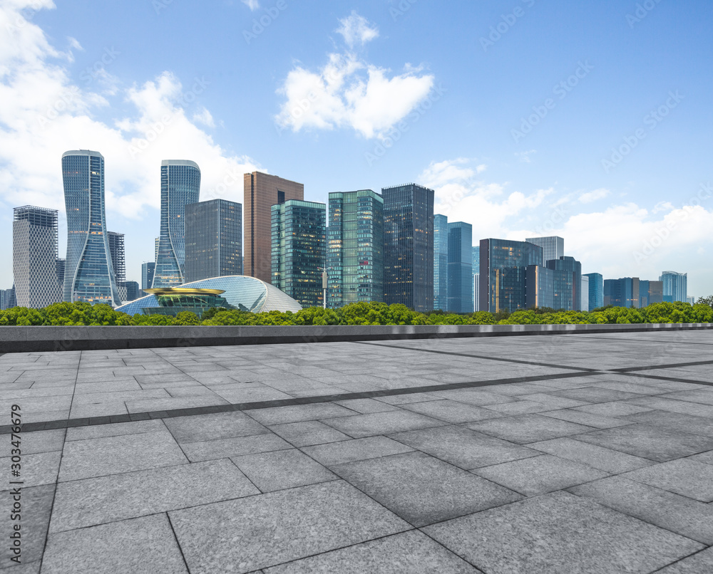 empty square and city skyline under blue sky, hangzhou city, china. empty square and city skyline under blue sky, hangzhou city, china.