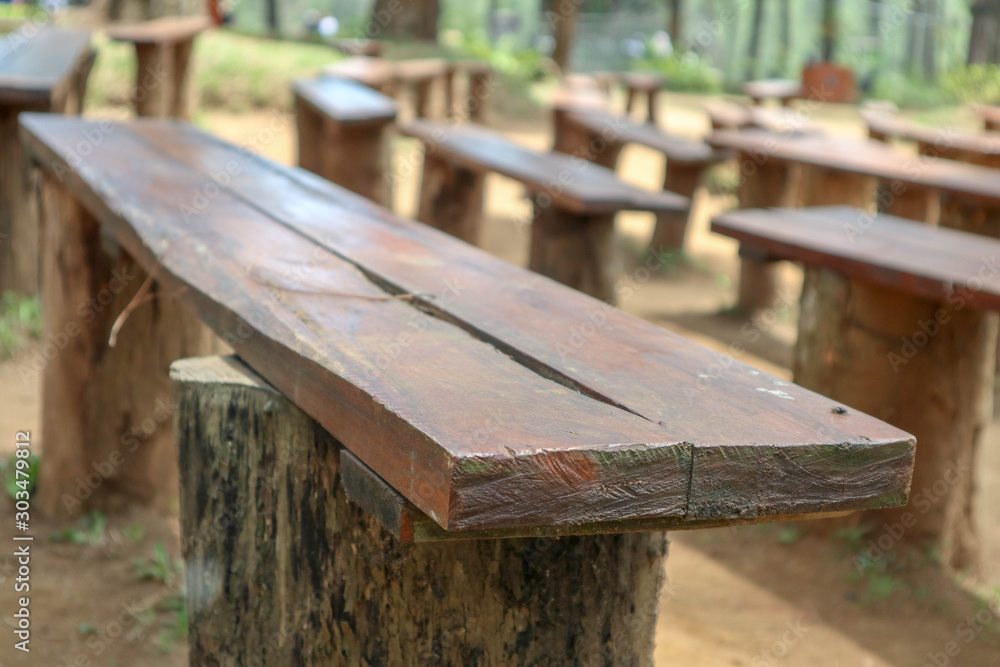 Fototapeta premium long wood chair or long board for sit people on the garden or theater