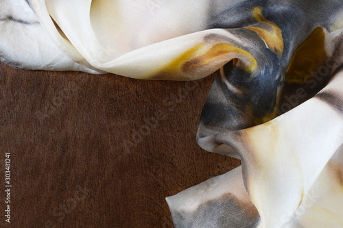 Silk colored fabric on dark...