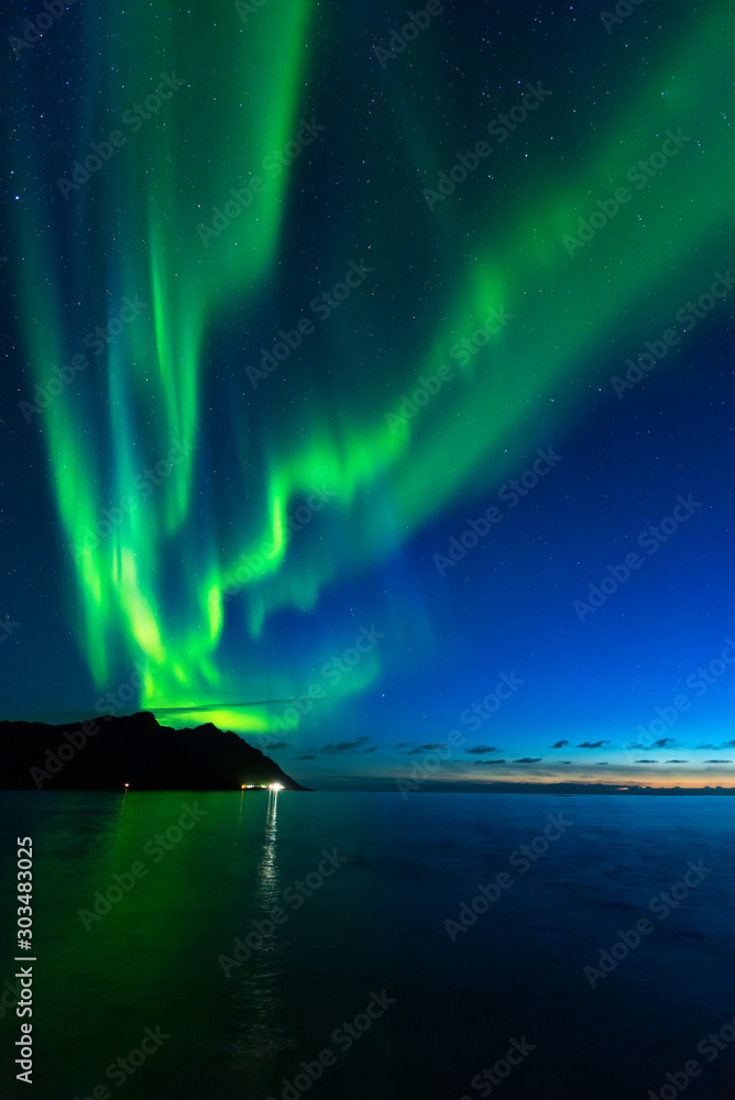 Aurora Borealis, northern lights at Tungeneset beach, Ersfjord, Senja, Norway